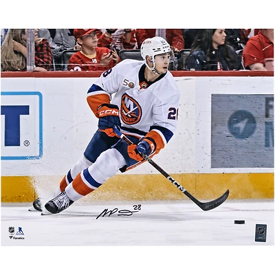 New York Islanders Alexander Romanov Autographed 16" x 20" White Jersey with Puck Photograph