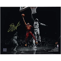 Donovan Mitchell Cleveland Cavaliers Autographed 11" x 14" Spotlight Layup Versus Boston Celtics Photograph