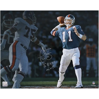 Phil Simms New York Giants Autographed 16" x 20" Super Bowl XXI vs. Broncos Spotlight Photograph with "S.B. XXI M.V.P." Inscription