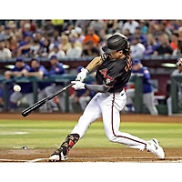 Corbin Carroll Arizona Diamondbacks Unsigned Black Jersey Swing Photograph