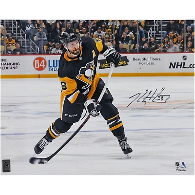 Kris Letang Pittsburgh Penguins Autographed 16" x 20" Black Jersey Shooting Photograph