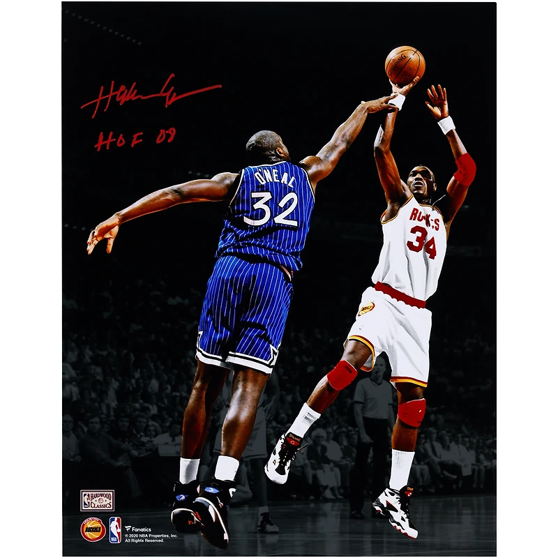 Hakeem Olajuwon Houston Rockets Autographed 11" x 14" Jump Shot Over Shaquille O'Neal Spotlight Photograph with "HOF 08" Inscription