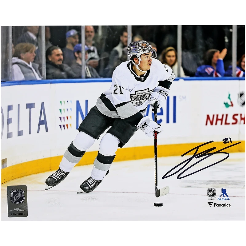 Jordan Spence Los Angeles Kings Autographed 8" x 10" White Jersey with Puck Photograph