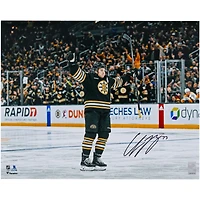 Charlie McAvoy Boston Bruins Autographed 16" x 20" Black 100th Anniversary Jersey Celebrating Photograph