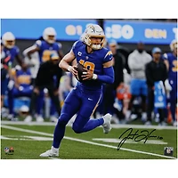 Justin Herbert Los Angeles Chargers Autographed 16" x 20" Royal Jersey Scrambling Photograph
