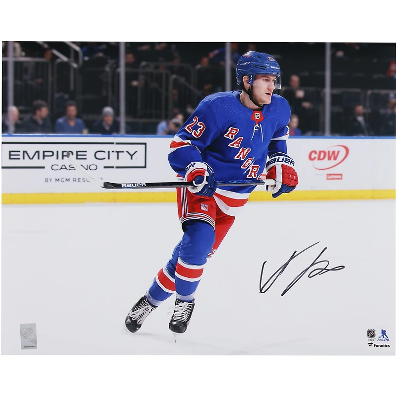 Adam Fox New York Rangers Autographed 16" x 20" Blue Jersey Skating Photograph