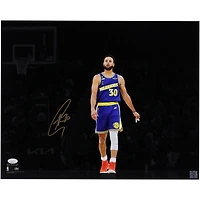 Stephen Curry Golden State Warriors Autographed 16" x 20" Holding Mouth Guard Spotlight Photograph - JSA