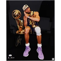 Stephen Curry Golden State Warriors Autographed 16" x 20" Holding Trophy Spotlight Photograph - Signed in Gold Ink - JSA