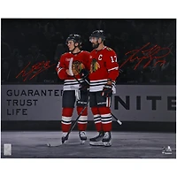 Connor Bedard & Nick Foligno Chicago Blackhawks Autographed 16" x 20" Red Jersey Spotlight Photograph