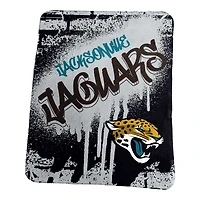 Logo Brands Jacksonville Jaguars 50" x 60" Classic Graffiti Fleece Throw Blanket