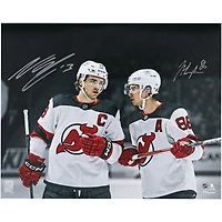 Jack Hughes & Nico Hischier New Jersey Devils Autographed 16" x 20" White Jersey Spotlight Photograph