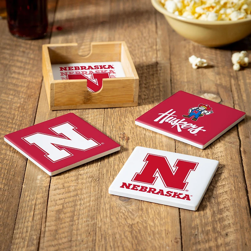Nebraska Huskers Four-Piece Ceramic Coaster Set with Wood Caddy
