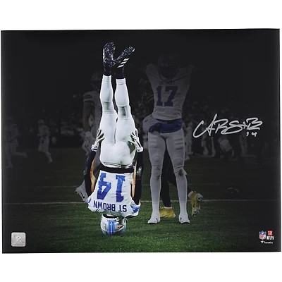 Amon-Ra St. Brown Detroit Lions Autographed 16" x 20" Head Stand Celebration Spotlight Photograph