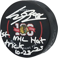 Connor Bedard Chicago Blackhawks Autographed 100th Anniversary Official Game Puck with "1st NHL Hat Trick 10-28-25" Inscription