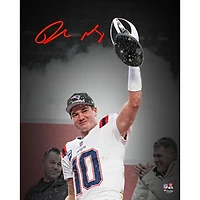 Drake Maye New England Patriots Autographed 16" x 20" Holding 2025 AFC Championship Trophy Spotlight Photograph