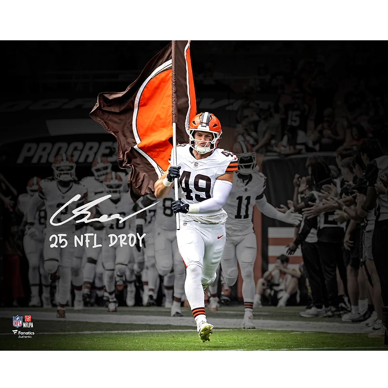 Carson Schwesinger Cleveland Browns Autographed 16" x 20" Running Out with Flag Spotlight Photograph with "25 NFL DROY" Inscription