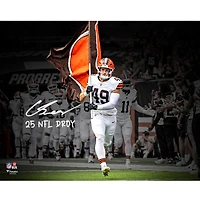 Carson Schwesinger Cleveland Browns Autographed 16" x 20" Running Out with Flag Spotlight Photograph with "25 NFL DROY" Inscription