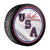 Brock Faber Team USA Autographed 2026 Winter Olympics Hockey Puck with "26 Gold Medal" Inscription
