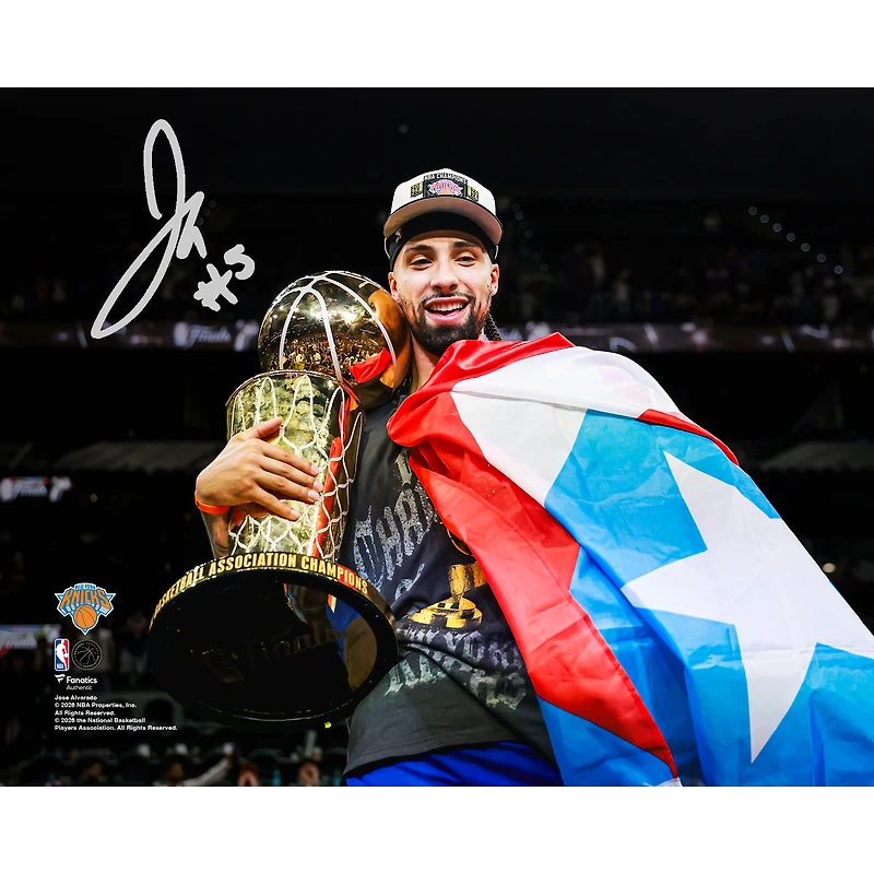 Jose Alvarado New York Knicks Autographed 2026 NBA Finals Champions 8" x 10" Holding Larry O'Brien Trophy Spotlight Photograph