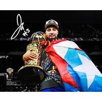 Jose Alvarado New York Knicks Autographed 2026 NBA Finals Champions 8" x 10" Holding Larry O'Brien Trophy Spotlight Photograph