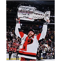Jaccob Slavin Carolina Hurricanes Autographed 2026 Stanley Cup Champions 16" x 20" Raising Cup Photograph with "2026 SC Champs" Inscription
