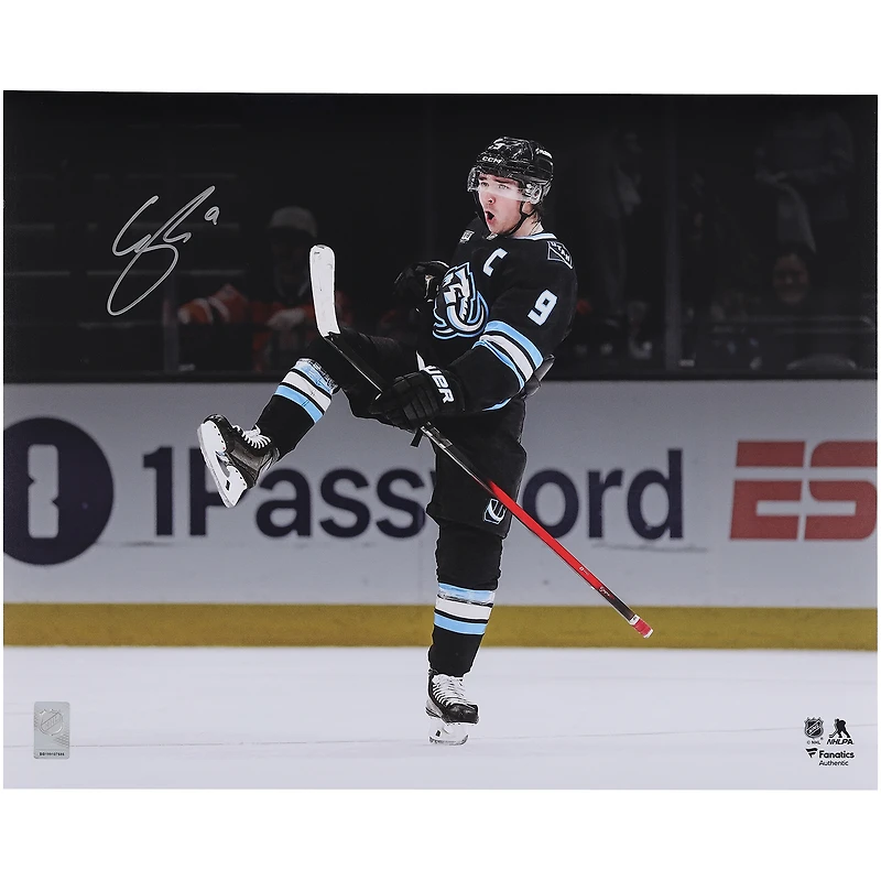 Clayton Keller Utah Mammoth Autographed 16" x 20" Black Jersey Celebration Spotlight Photograph