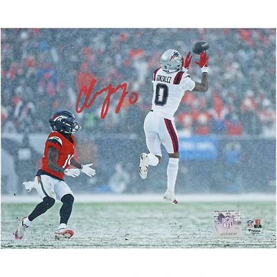 Christian Gonzalez New England Patriots Autographed 8" x 10" Snow Interception Photograph