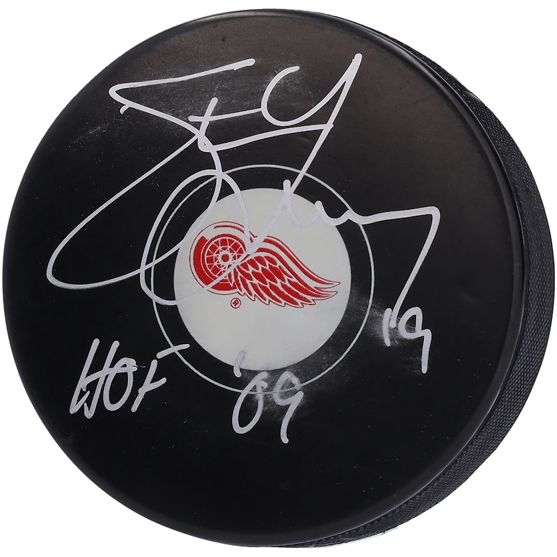 Steve Yzerman Detroit Red Wings Autographed Hockey Puck with "HOF 09" Inscription