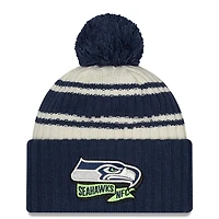 Men's New Era Cream/College Navy Seattle Seahawks 2022 Sideline Sport Cuffed Pom Knit Hat