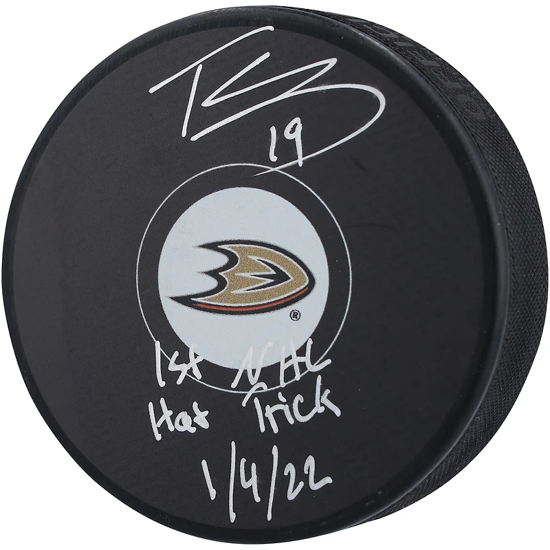 Troy Terry Anaheim Ducks Autographed Hockey Puck with "1st NHL Hat Trick 1/4/22" Inscription