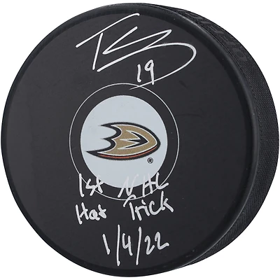Troy Terry Anaheim Ducks Autographed Hockey Puck with "1st NHL Hat Trick 1/4/22" Inscription