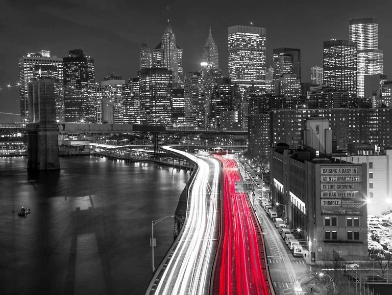 Assaf Frank - Strip lights on streets of Manhattan by east river, New York