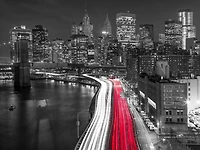 Assaf Frank - Strip lights on streets of Manhattan by east river, New York