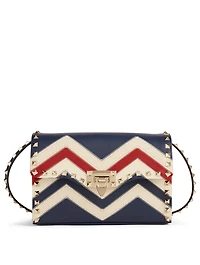 Medium Rockstud Leather Crossbody Bag In Chevron