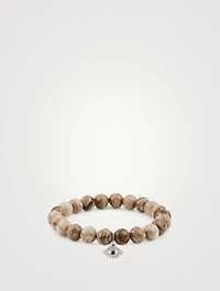 Beaded Bracelet With 14K White Gold Large Diamond And Sapphire Evil Eye Charm