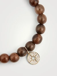 Beaded Bracelet With 14K Gold Diamond Starburst Charm