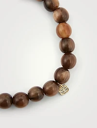 Beaded Bracelet With 14K Gold Diamond Starburst Charm