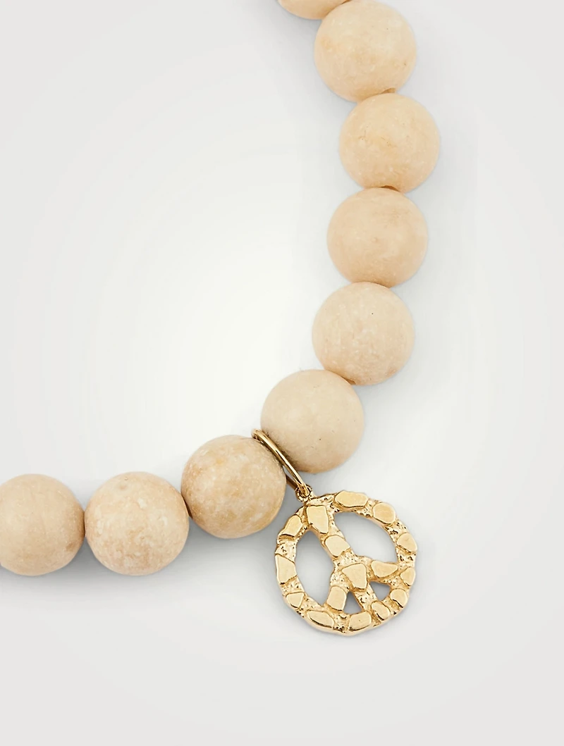 Coral Beaded Bracelet With 14K Gold Peace Sign Charm