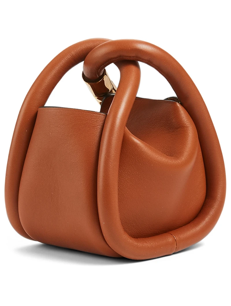 Wonton Charm Leather Crossbody Bag