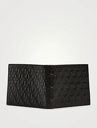 YSL Monogram Embossed Leather Bifold Wallet