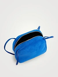 Medium Dome Suede Crossbody Bag