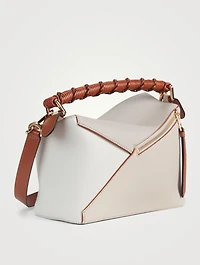 Small Puzzle Edge Leather Bag