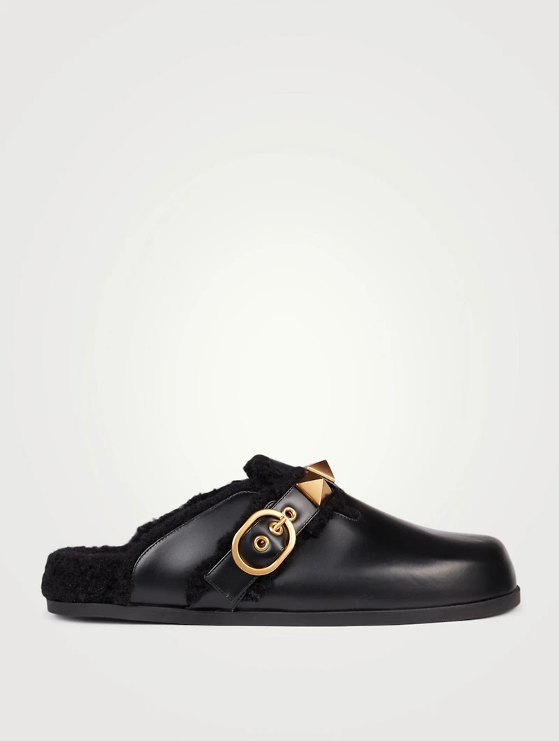 Roman Stud Leather And Shearling Flat Mules