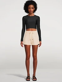 The Crop Silhouette Long-Sleeve Swim Top