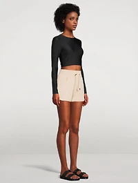 The Crop Silhouette Long-Sleeve Swim Top
