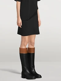 Logo-Debossed Leather Knee-High Boots
