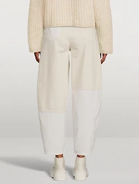 Cutline Curved-Leg Jeans
