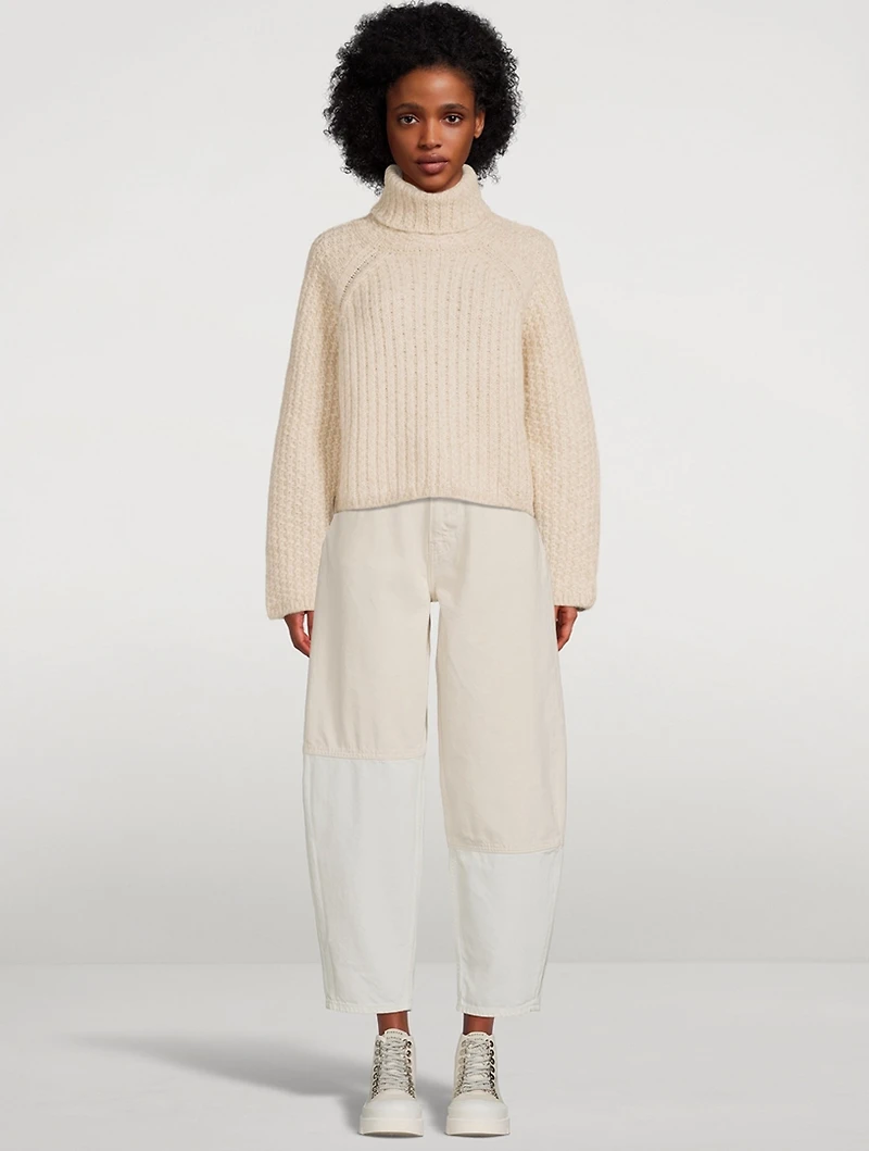 Cutline Curved-Leg Jeans