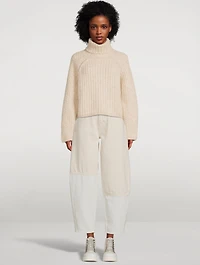 Cutline Curved-Leg Jeans