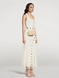 Four-Ring Woven Straw Clutch